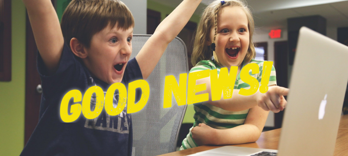 Children cheering at their screen